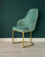 Дизайнерский стул MONRO от мебельной компании RIHOT на металлическом каркасе. Цвет ткани - AQUAMARINE. Цвет каркаса - золото. 1 шт