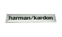 Эмблема Harman Kardon на динамик