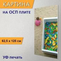 Вертикальная картина на ОСП "Играющий ребенок, песок, игрушки из песка" 62x125 см. для интерьериа
