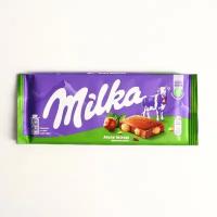 Шоколадная плитка Milka, с цельным фундуком, 100 г