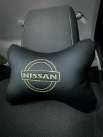 На подголовник Nissan