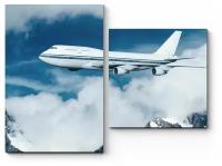 Модульная картина Пассажирский самолет в облаках80x60