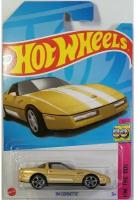 Машинка Hot Wheels коллекционная (оригинал) 84 CORVETTE золотистый HKG83
