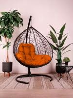 Подвесное кресло XL с ротангом чёрное, оранжевая подушка