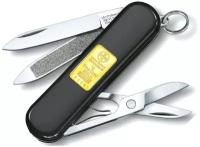Нож перочинный Victorinox Classic 0.6203.87 с золотым слитком 1гр 58мм 7 функций черный 0.6203.87