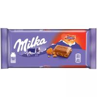 Шоколад Milka Daim молочный с кусочками миндальной карамели