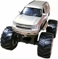 Игрушка модель машины 1:34-39 Chevrolet Tahoe Big Wheel 47002 Welly