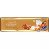 Шоколад Lindt Swiss premium молочный с фундуком и изюмом