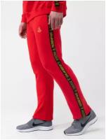Спортивные штаны красного цвета с лампасами, без манжета. Плотный футер размер 40
